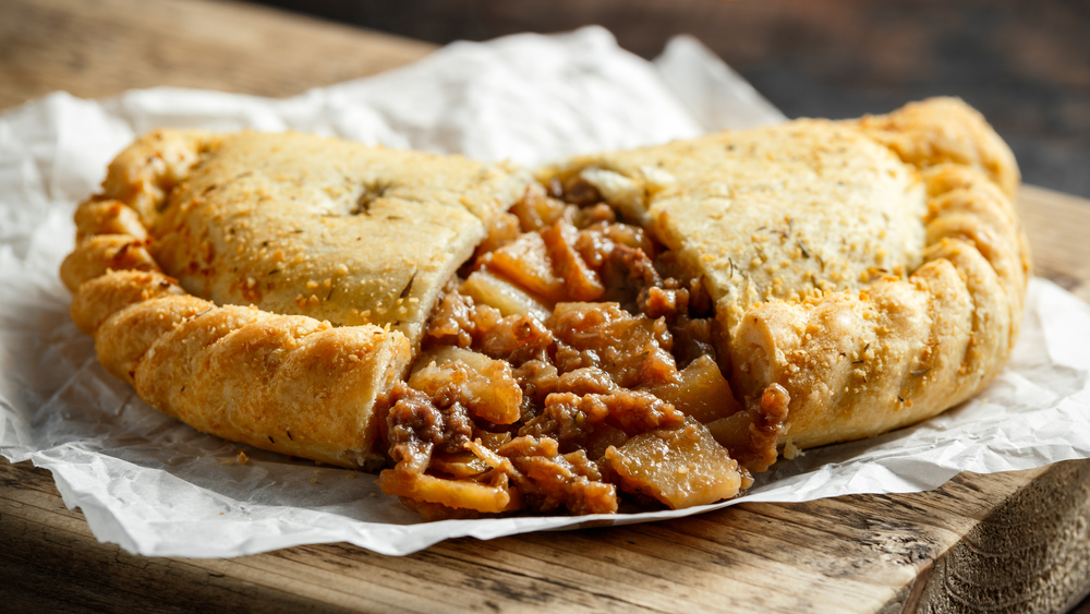 Traditional,Cornish,Pasty,Filled,With,Beef,Meat,,Potato,And,Vegetables