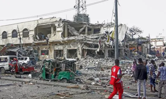 Somalia’s President Says at Least 100 Killed in Car Bombings