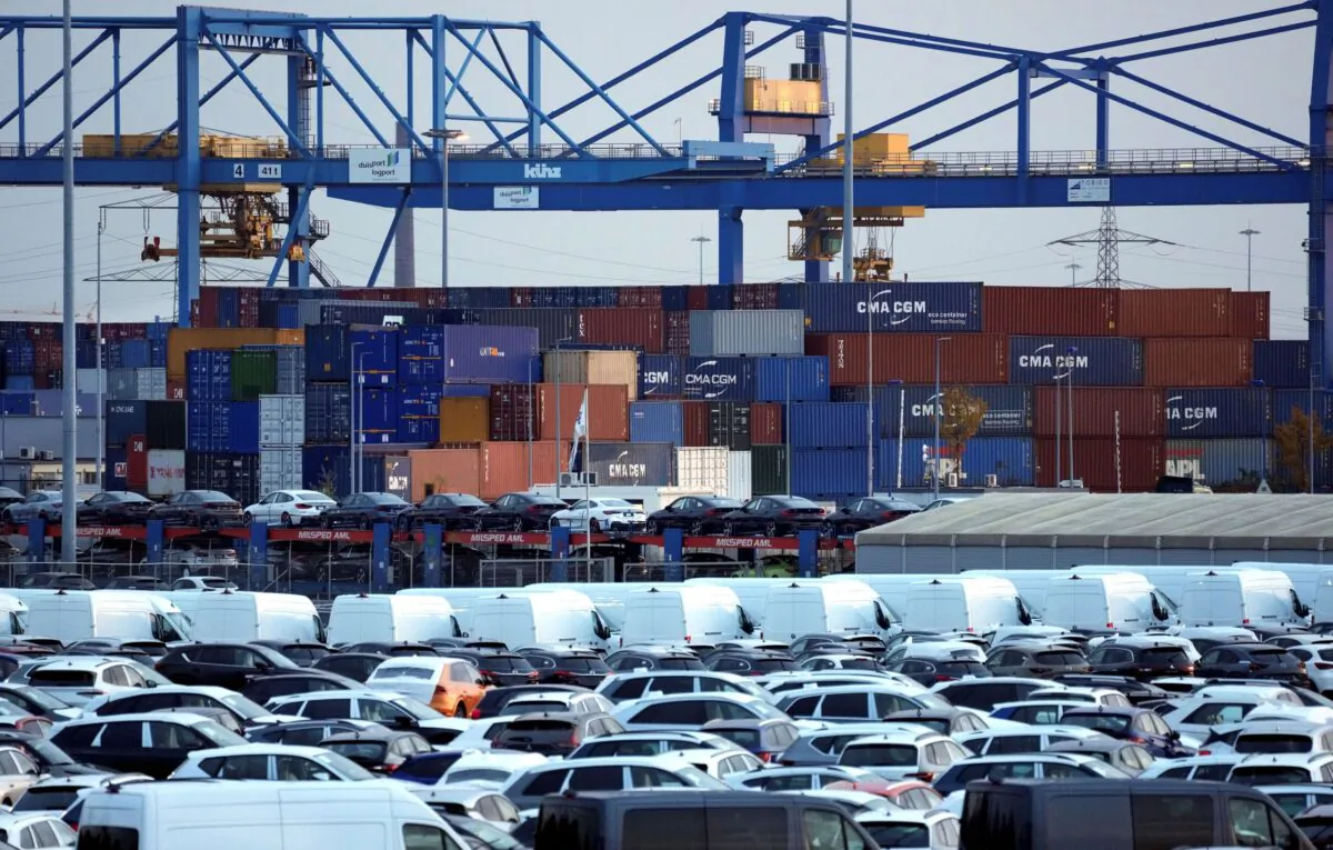 Cars and containers are pictured at the 'duisport logport' logistics center at the river Rhine in Duisburg, Germany, on Oct. 28, 2022. (Michael Sohn/AP Photo)