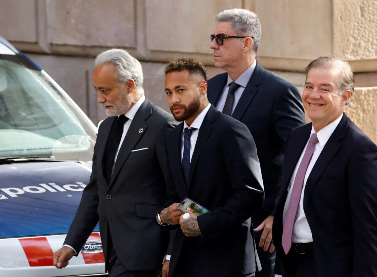Brazil's Neymar arrives at court to stand trial on fraud and corruption charges over the transfer to FC Barcelona from Santos in 2013, in Barcelona, Spain, on Oct. 18, 2022. (Albert Gea/Reuters)