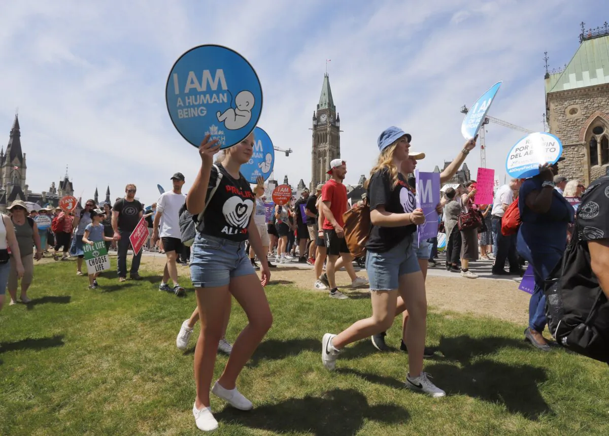 People take part in the March for Life on Parliament Hill in Ottawa on May 12, 2022. (The Canadian Press/ Patrick Doyle)