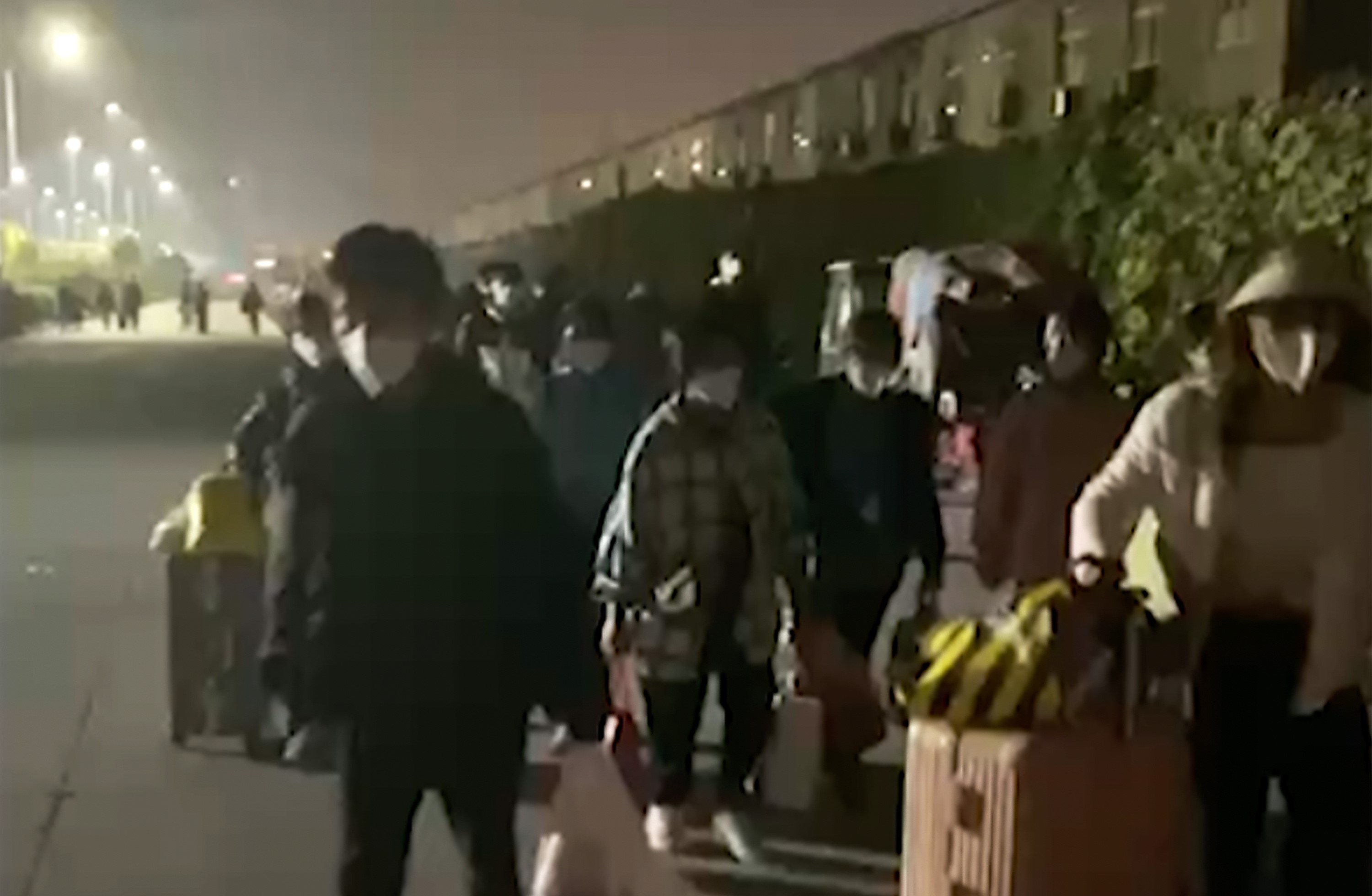 Long Walk Home: Workers Fleeing Foxconn Are Both Impeded and Helped on Their Way - Vimarsana News