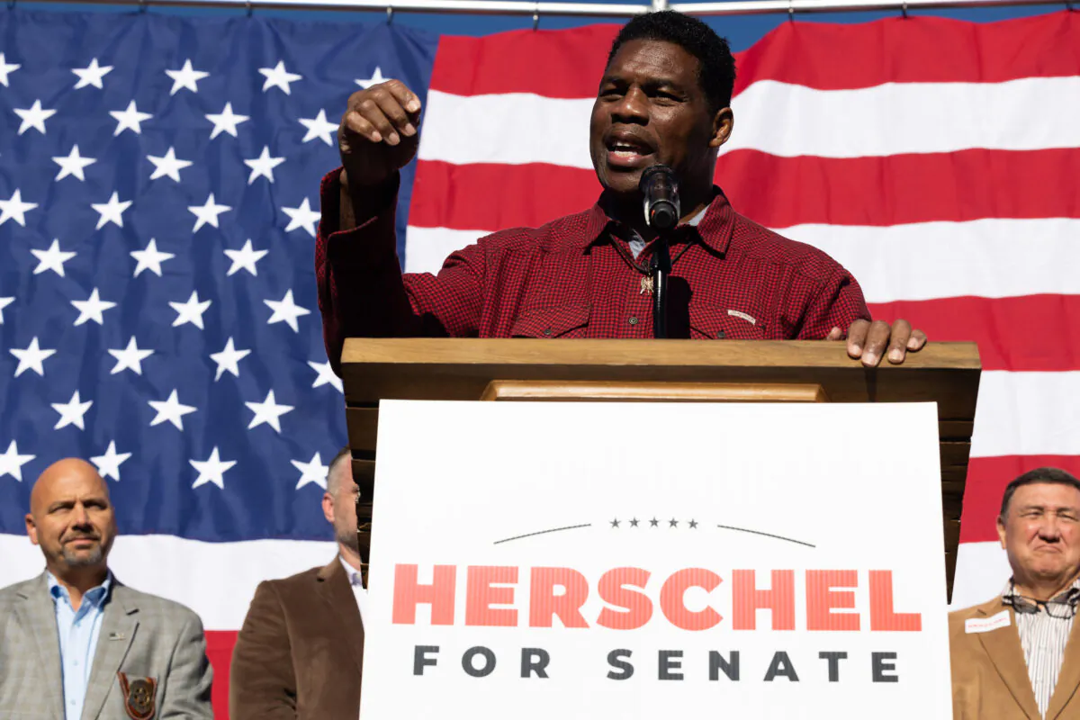 Georgia Republican Senate nominee Herschel Walker addresses the crowd of supporters during a campaign stop in Macon, Ga., on Oct. 20, 2022. (Jessica McGowan/Getty Images)