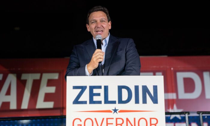 Florida Gov. Ron DeSantis campaigns alongside New York Republican gubernatorial hopeful, Rep. Lee Zeldin (R-N.Y.) at a "Get Out the Vote" rally in Hauppauge, N.Y., on Oct. 29, 2022. (David Dee Delgado/Getty Images)