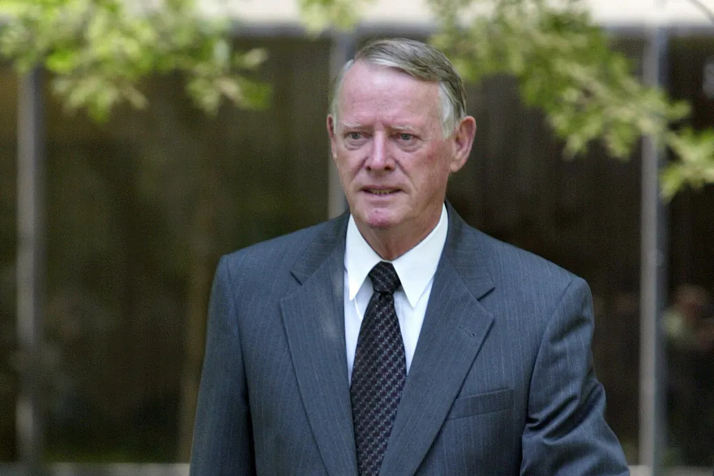 Fairfax Commonwealth attorney Robert Horan Jr. leaves the Fairfax County Courthouse in Fairfax on Tuesday, June 22, 2004. (Evan Vucci/AP Photo)