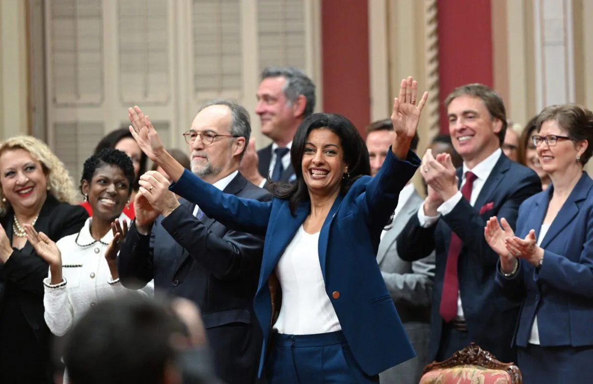 Quebec Liberal Leader Dominique Anglade waves as she enters with her elected caucus to be sworn in during a ceremony at the legislature in Quebec City, Oct. 18, 2022. (The Canadian Press/Jacques Boissinot)