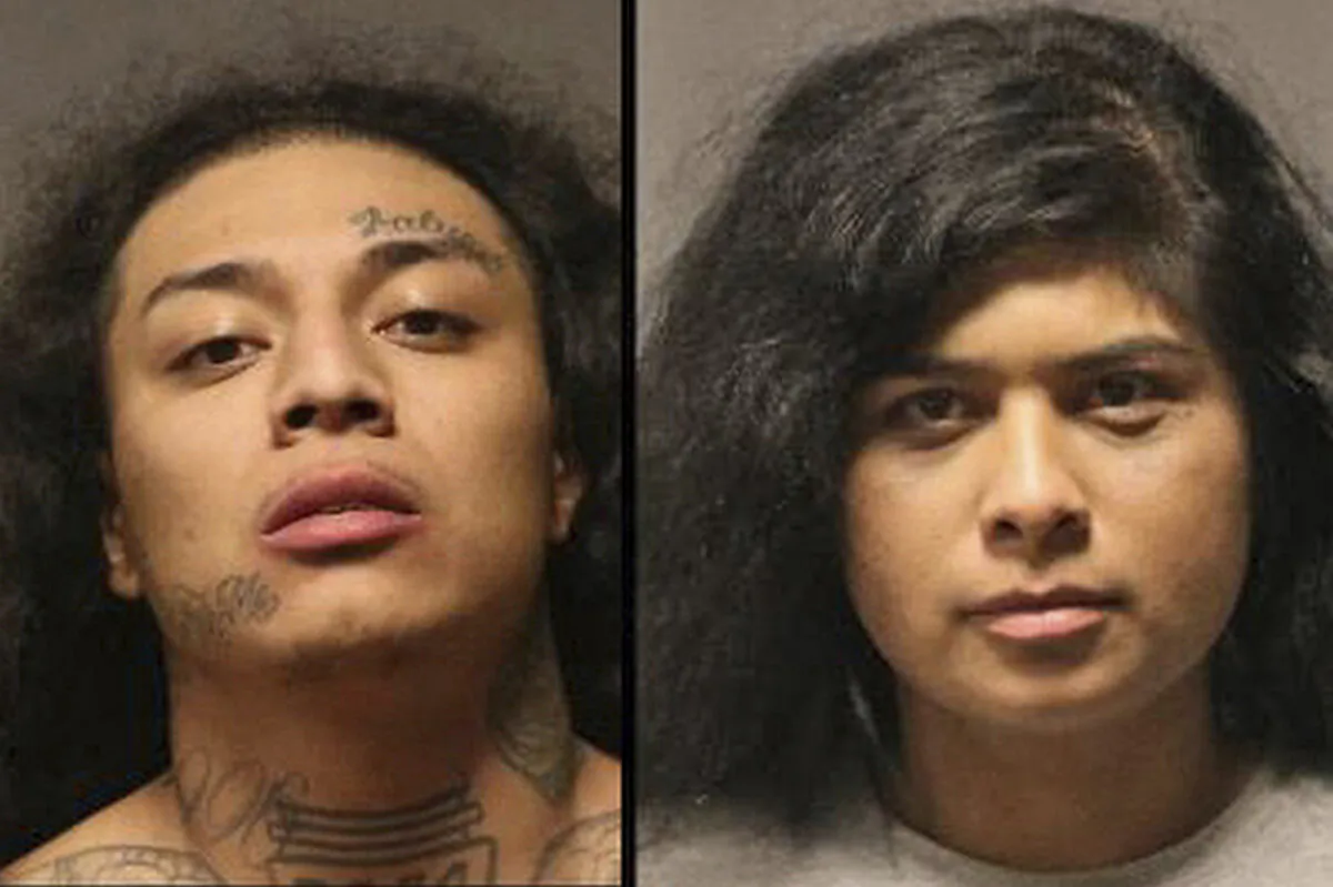 Booking photos of suspects Michael Alexander Rodriguez (L) and Bich Dao Vo, aka Michelle Rodriguez. (Westminster Police Department via AP)