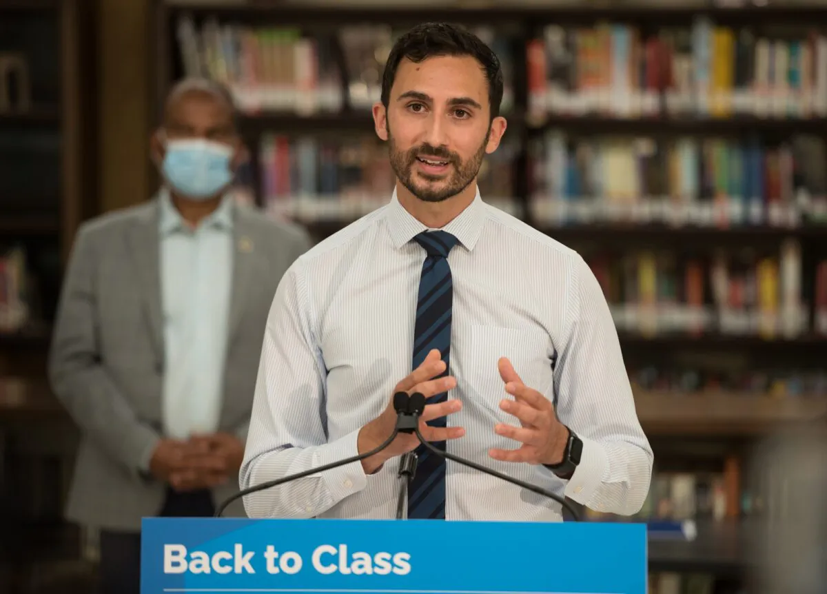 Ontario Minister of Education Stephen Lecce makes an announcement at St. Robert Catholic High School in Toronto on Aug. 4, 2021. (The Canadian Press/Tijana Martin)
