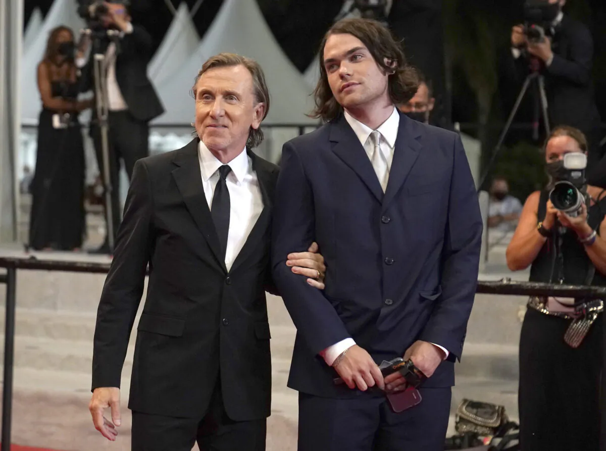 Tim Roth (L) and his son Cormac Roth appear at the premiere of the film "Bergman Island" at the 74th international film festival, Cannes, southern France, on July 11, 2021. (Brynn Anderson/AP Photo) 