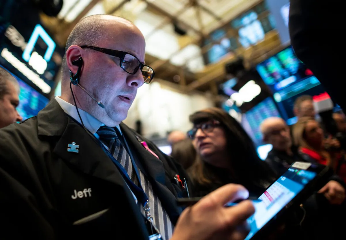 Traders work after the opening bell at the New York Stock Exchange (NYSE) on Oct. 28, 2019. (ohannes Eisele/AFP via Getty Images)