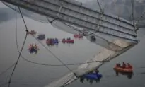 9 Arrested After Bridge Collapses in India, Killing 134