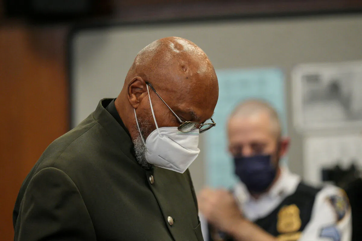 Muhammad Aziz, 83, one of the two men who spent decades in prison for murdering Malcolm X in 1965, looks down during his exoneration trial by a New York state judge at State Supreme Court in New York on Nov. 18, 2021. (Curtis Means/Pool via Reuters)