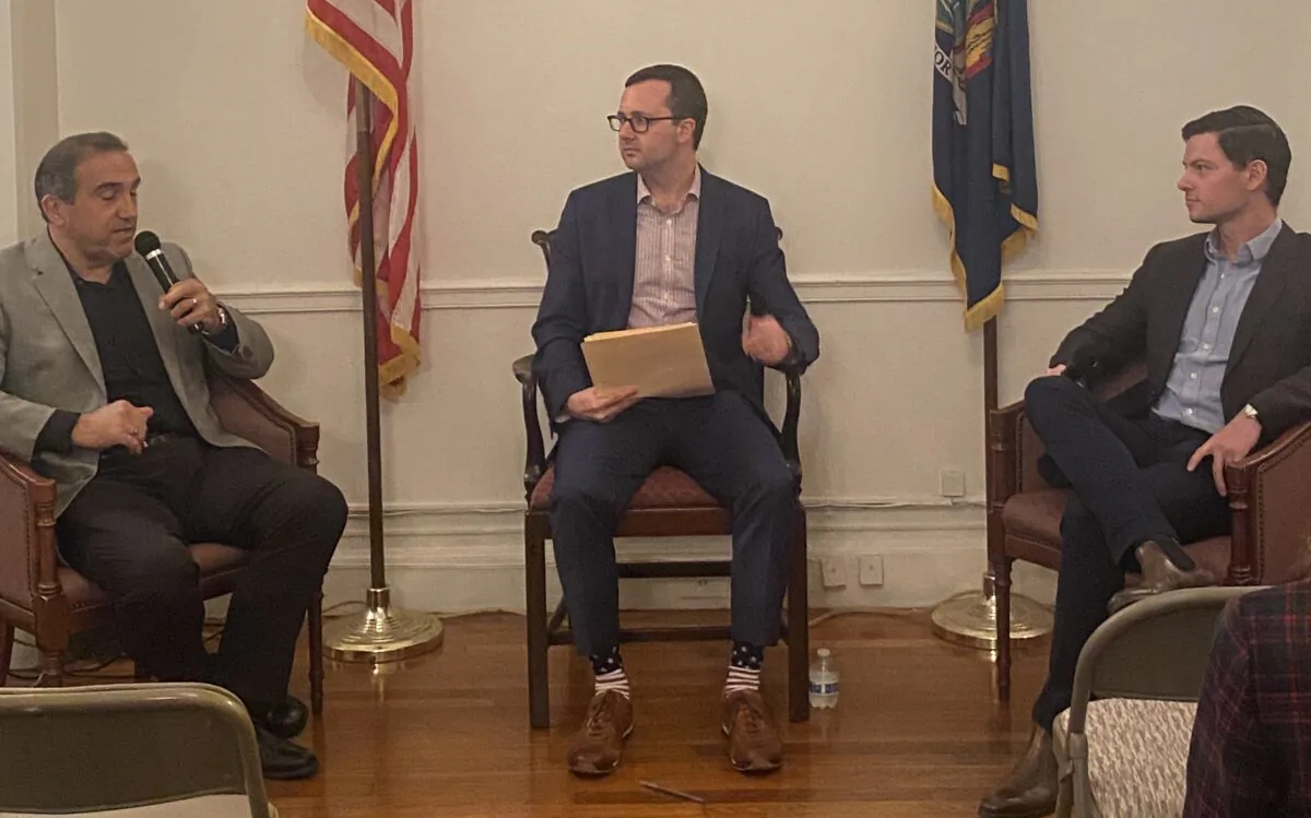 (L-R) Marc Morano, founder and executive director of ClimateDepot.org, Met Club Treasurer John Sweeney, and Quill Robinson, vice president of government affairs with the American Conservation Coalition, debate in New York on Oct. 26, 2022. (Juliette Fairley/The Epoch Times)
