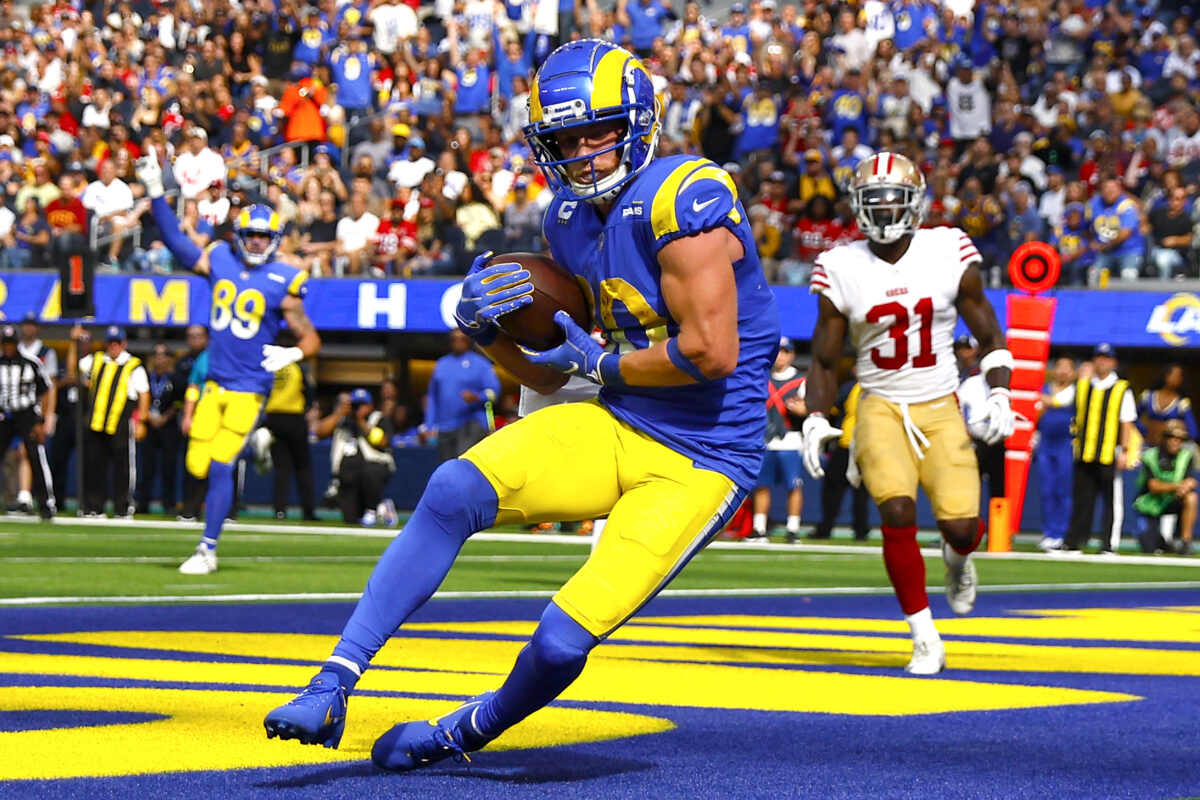McCaffrey throws, catches, rushes for TDs, Niners rout Rams