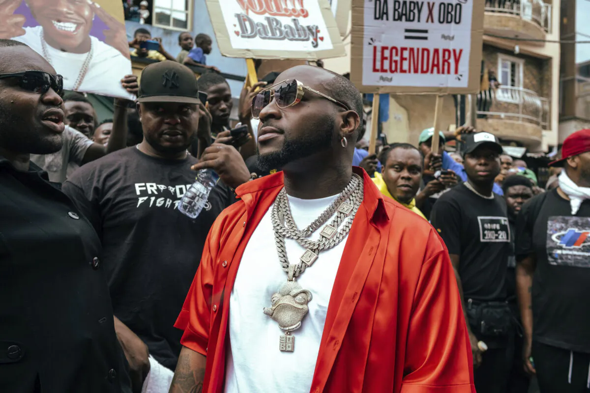 Nigeria's Afrobeats star Davido (C) attends a music video shoot in Lagos, Nigeria, on May 17, 2022. (Grace Ekpu/AP Photo)
