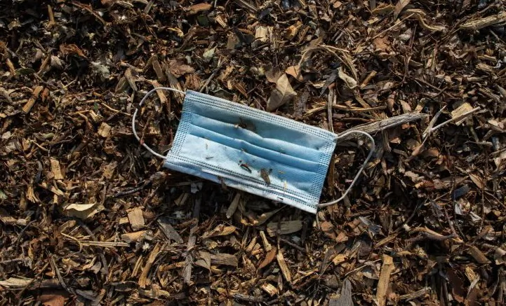 A discarded face mask is pictured on the sidewalk in Long Beach, Calif., on Aug. 22, 2020. (Apu Gomes/AFP via Getty Images)