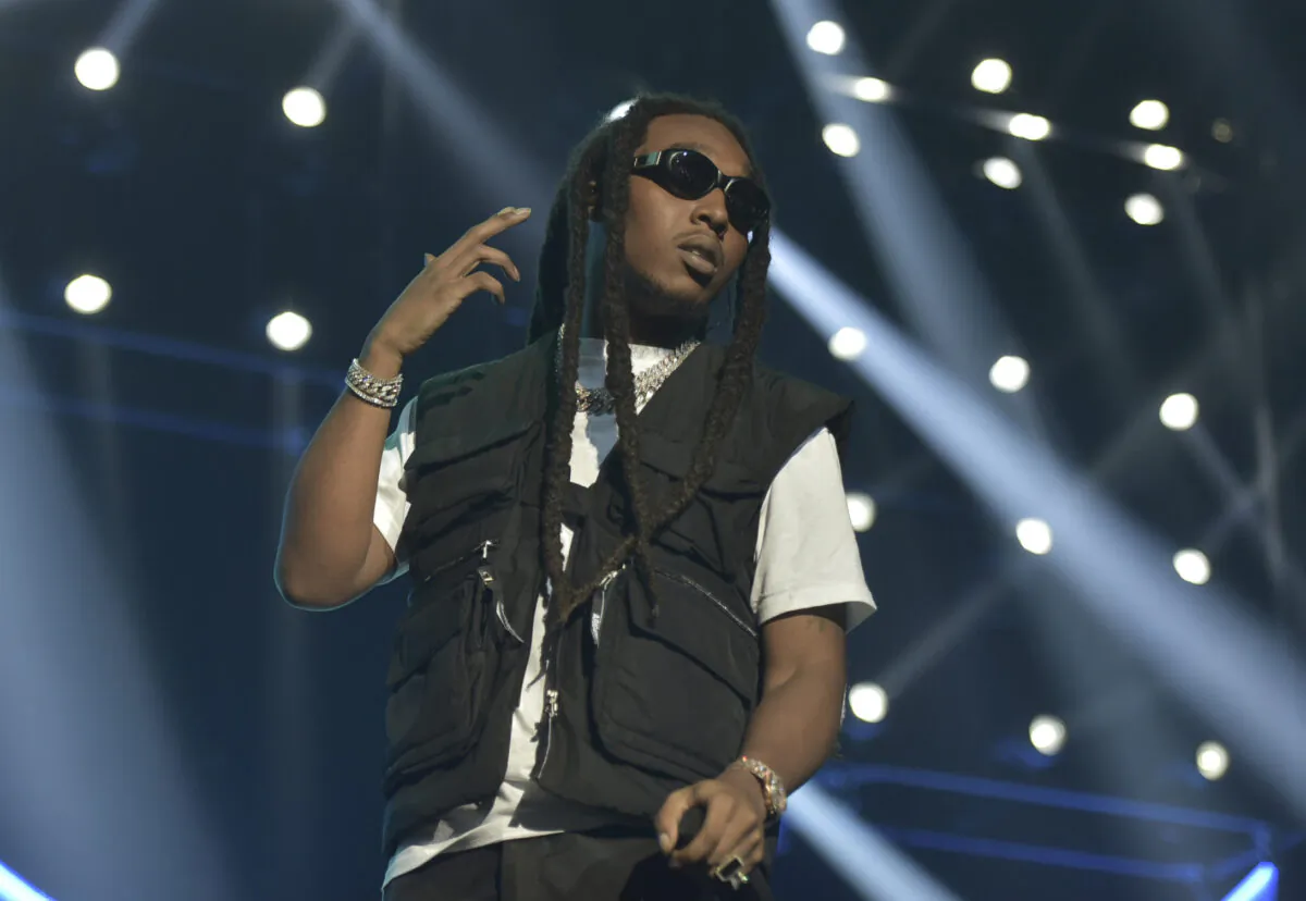 Takeoff of the group Migos performs during the 2019 BET Experience in Los Angeles on June 22, 2019. (Richard Shotwell/Invision/AP)