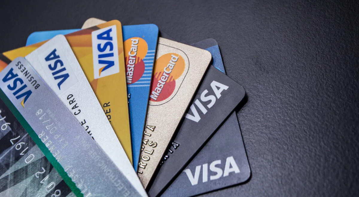 Credit card addictions can hurt relationships as well as finances. (Theethawat Bootmata/Shutterstock)