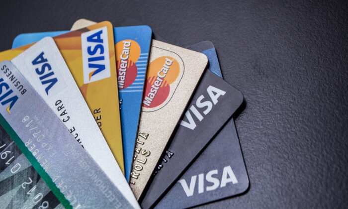 Applications for credit cards have risen despite rising interest rates. (Theethawat Bootmata/Shutterstock)