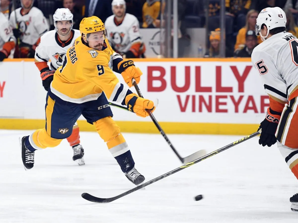 Nashville Predators left wing Filip Forsberg (9) has his shot blocked by Anaheim Ducks defenseman Colton White (45) during the first period at Bridgestone Arena in Nashville, on Nov. 29, 2022. (Christopher Hanewinckel/USA TODAY Sports via Field Level Media)