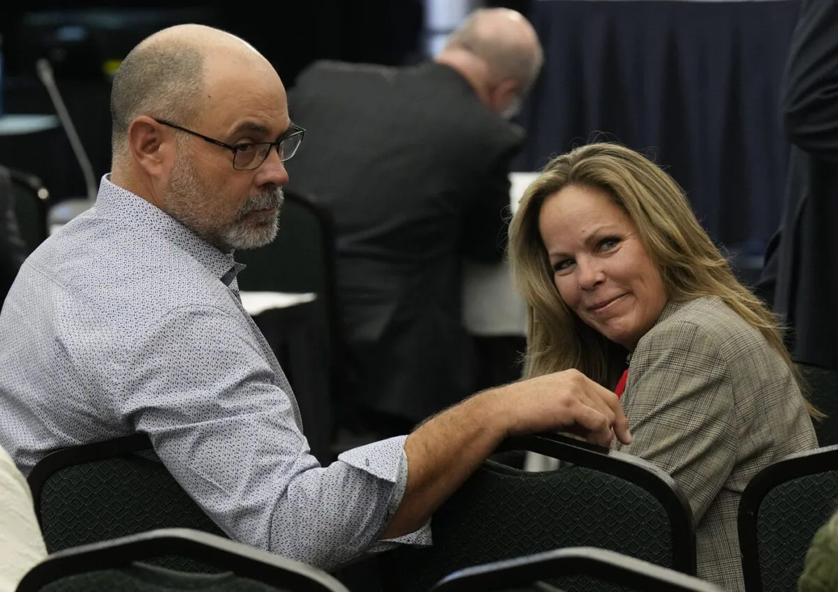Freedom Convoy organizers Tamara Lich and Chris Barber wait for the Public Order Emergency Commission hearing to begin, in Ottawa on Nov. 1, 2022. (The Canadian Press/Adrian Wyld)