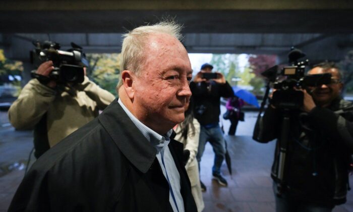 Outgoing Surrey Mayor Doug McCallum, who was defeated in the recent municipal election, arrives at provincial court for the first day of his public mischief trial, in Surrey, B.C., on Oct. 31, 2022. (The Canadian Press/Darryl Dyck)
