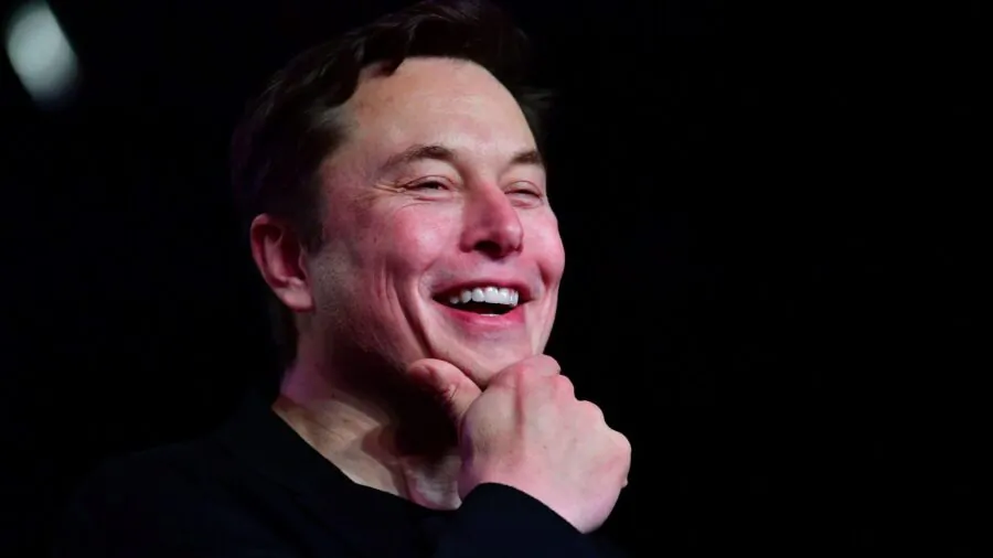Tesla CEO Elon Musk reacts during the unveiling of the new Tesla Model Y in Hawthorne, Calif., on March 14, 2019. (Frederic J. Brown/AFP via Getty Images)
