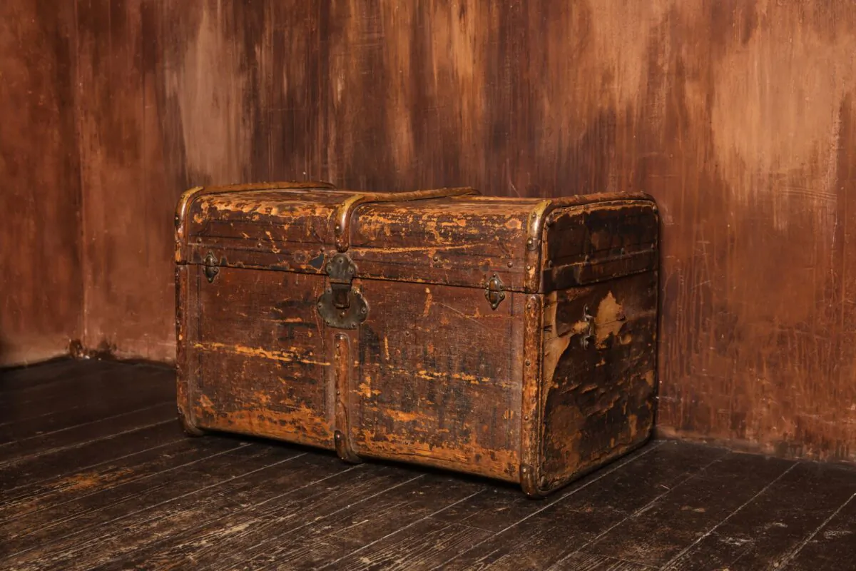 Nora, the protagonist in "The Shed Chamber," was given a bedroom upstairs that contains another smaller room with a door, bare except for some old trunks. (Alena Popova/Shutterstock) 