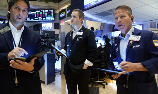 Stocks Fall After Fed Says Rates May Rise More Than Expected