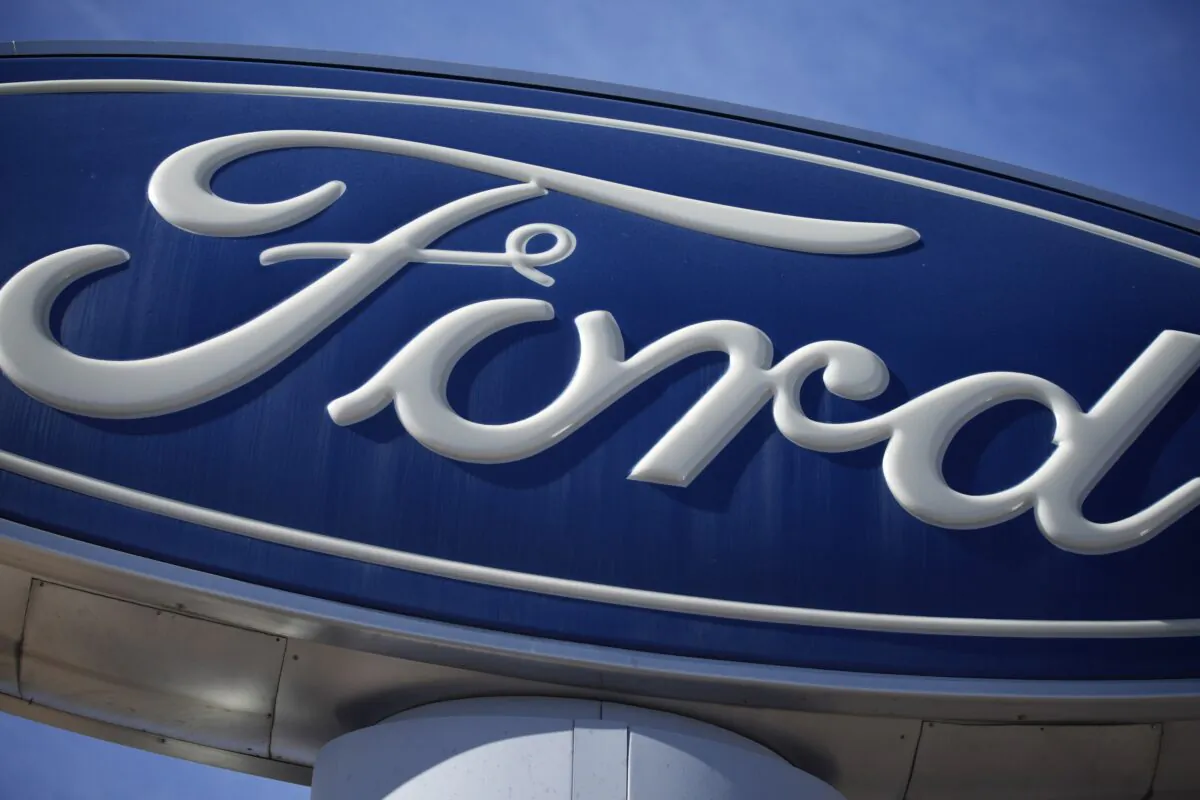 A Ford company logo on a sign at a Ford dealership in southeast Denver on Oct. 24, 2021. (David Zalubowski/AP Photo)