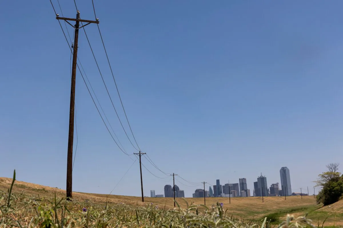 Utility poles lead to downtown Dallas during a heat advisory due to scorching weather in Dallas on July 12, 2022. (Shelby Tauber/Reuters)