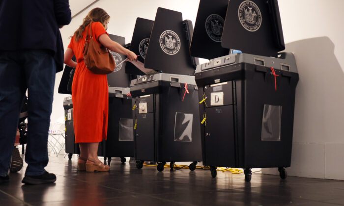 A woman casts her  ballot in New York City in a June 28, 2022, file image. (Michael M. Santiago/Getty Images)