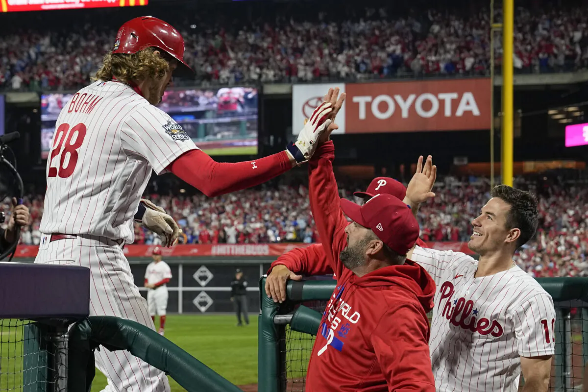 Philadelphia Phillies' Alec Bohm celebrates in the dugout after his home run during the second inning in Game 3 of baseball's World Series between the Houston Astros and the Philadelphia Phillies in Philadelphia, on  Nov. 1, 2022. (David J. Phillip/)
