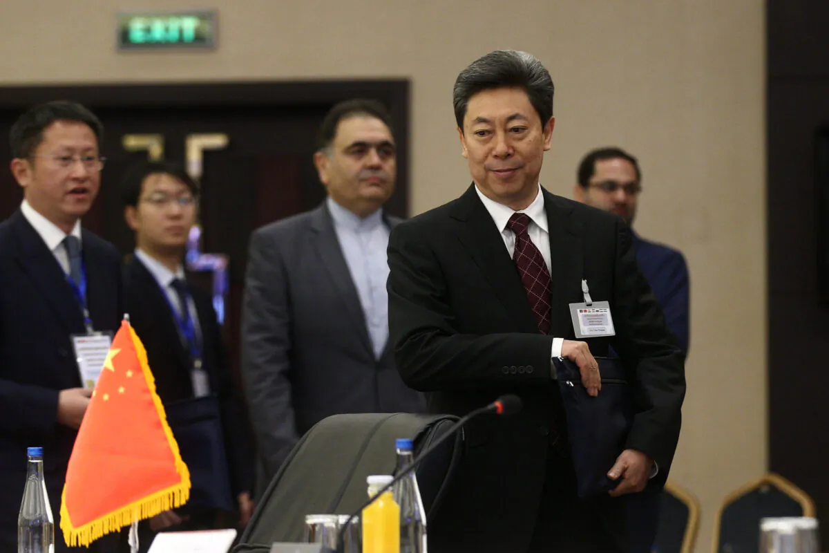 Chen Wenqing (R), Chinese Minister of State for Security, attends the meeting of national security secretaries of Iran, Russia, Uzbekistan, Tajikistan, Afghanistan, China and India, in the capital Tehran on Dec. 18, 2019. (Mohsen Ataei/fars news/AFP via Getty Images)