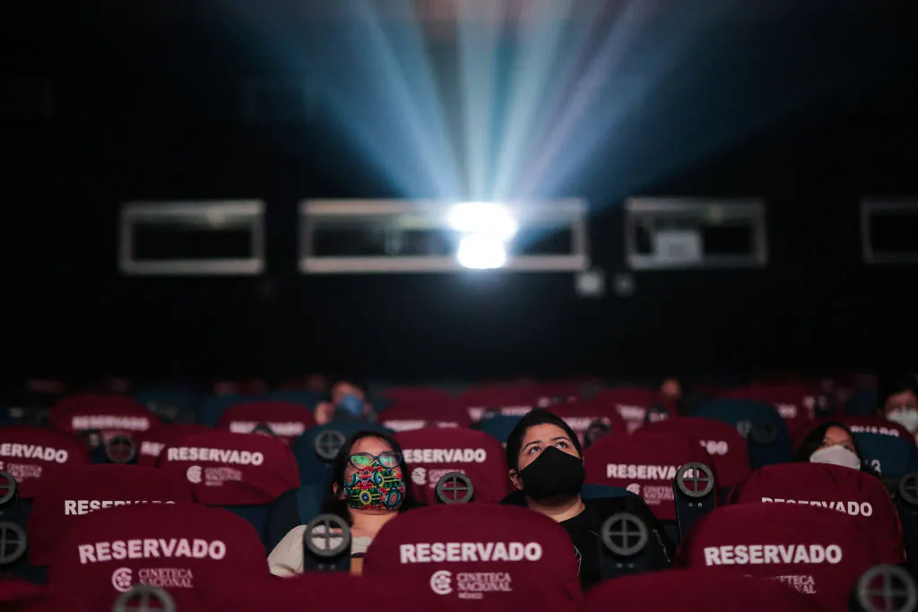 People attend a screening in the Cineteca Nacional during the reopening day of cinemas in Mexico City, Mexico, on Aug. 12, 2020. (Hector Vivas/Getty Images)