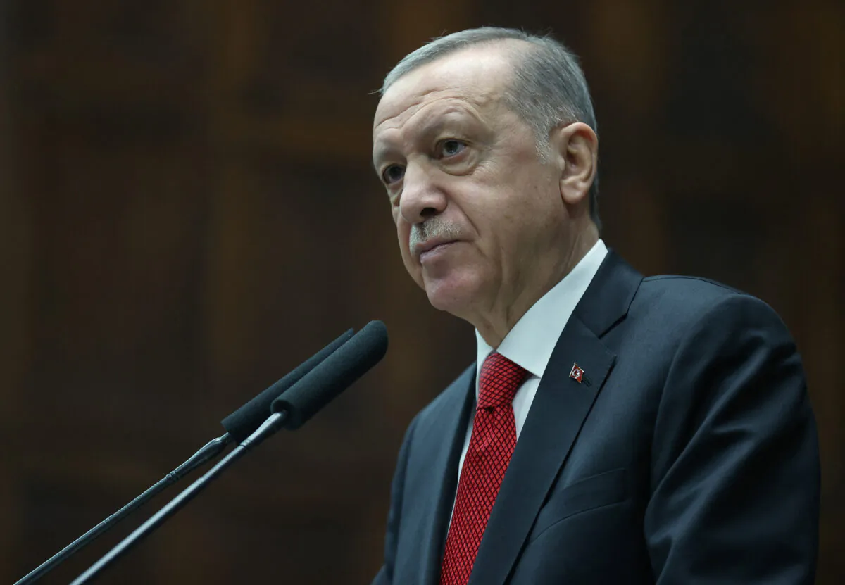 Turkish President Tayyip Erdogan addresses members of parliament from his ruling AK Party (AKP) during a meeting at the Turkish parliament in Ankara, Turkey, on Nov. 2, 2022. (Murat Cetinmuhurdar/PPO/Handout via Reuters)