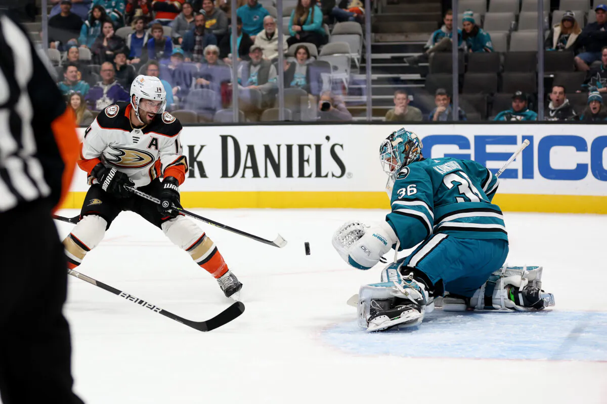 Adam Henrique (14) of the Anaheim Ducks scores a goal on Kaapo Kahkonen (36) of the San Jose Sharks in the first period at SAP Center in San Jose, Calif., on Nov. 1, 2022. (Ezra Shaw/Getty Images)