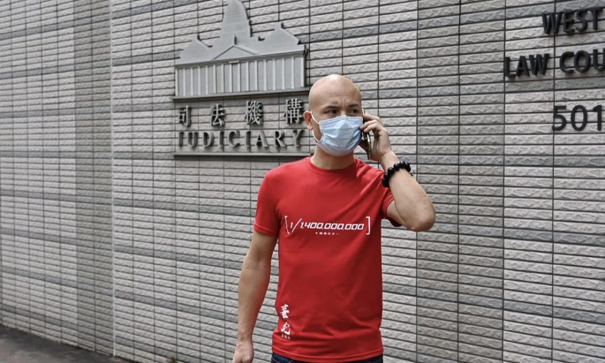 On October 31, 2022, the defendant Wu Oi-man outside the West Kowloon Magistrates' Court in Hong Kong. In December 2020, he repeatedly destroyed the Falun Gong truth clarification sites and was charged with 5 counts of "criminal damage." On October 31, the court convicted him and adjourned his sentence in December. (Sung Pi-Lung/The Epoch Times)
