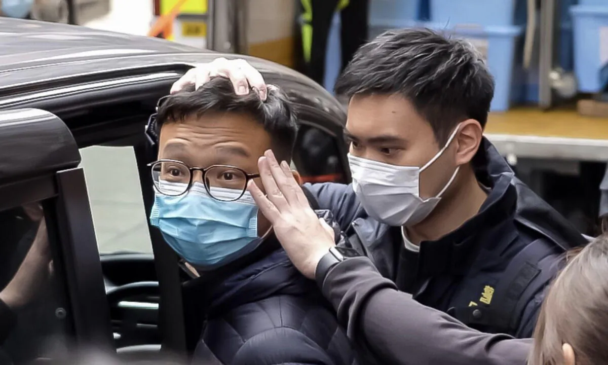 Patrick Lam Shiu-tong, acting editor-in-chief of Stand News, was arrested on Dec. 29, 2021. (Adrian Yu/The Epoch Times)