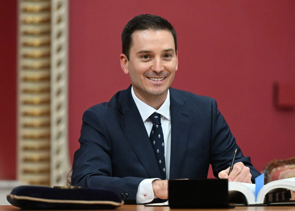 Quebec Justice Minister and government house leader Simon Jolin-Barrette is sworn in during a ceremony at the Quebec Legislature, in Quebec City, Oct. 20, 2022. (The Canadian Press/Jacques Boissinot)
