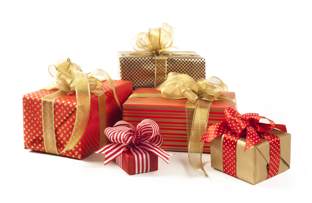 A stack of boxes wrapped like presents—or even better, real presents—delivers an effective holiday feel to the room. (sebra/Shutterstock)