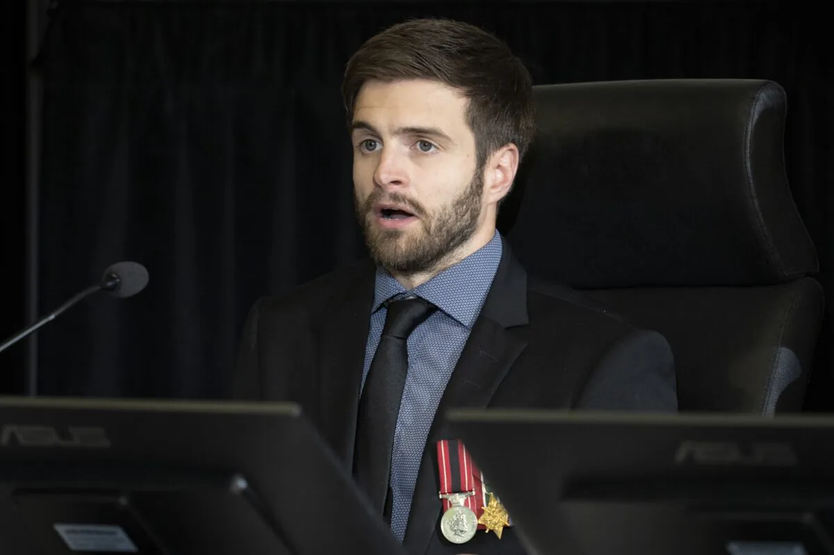Afghan war veteran Chris Deering responds to a question from counsel during the Public Order Emergency Commission hearing in Ottawa on Nov. 4, 2022. (Adrian Wyld/The Canadian Press)