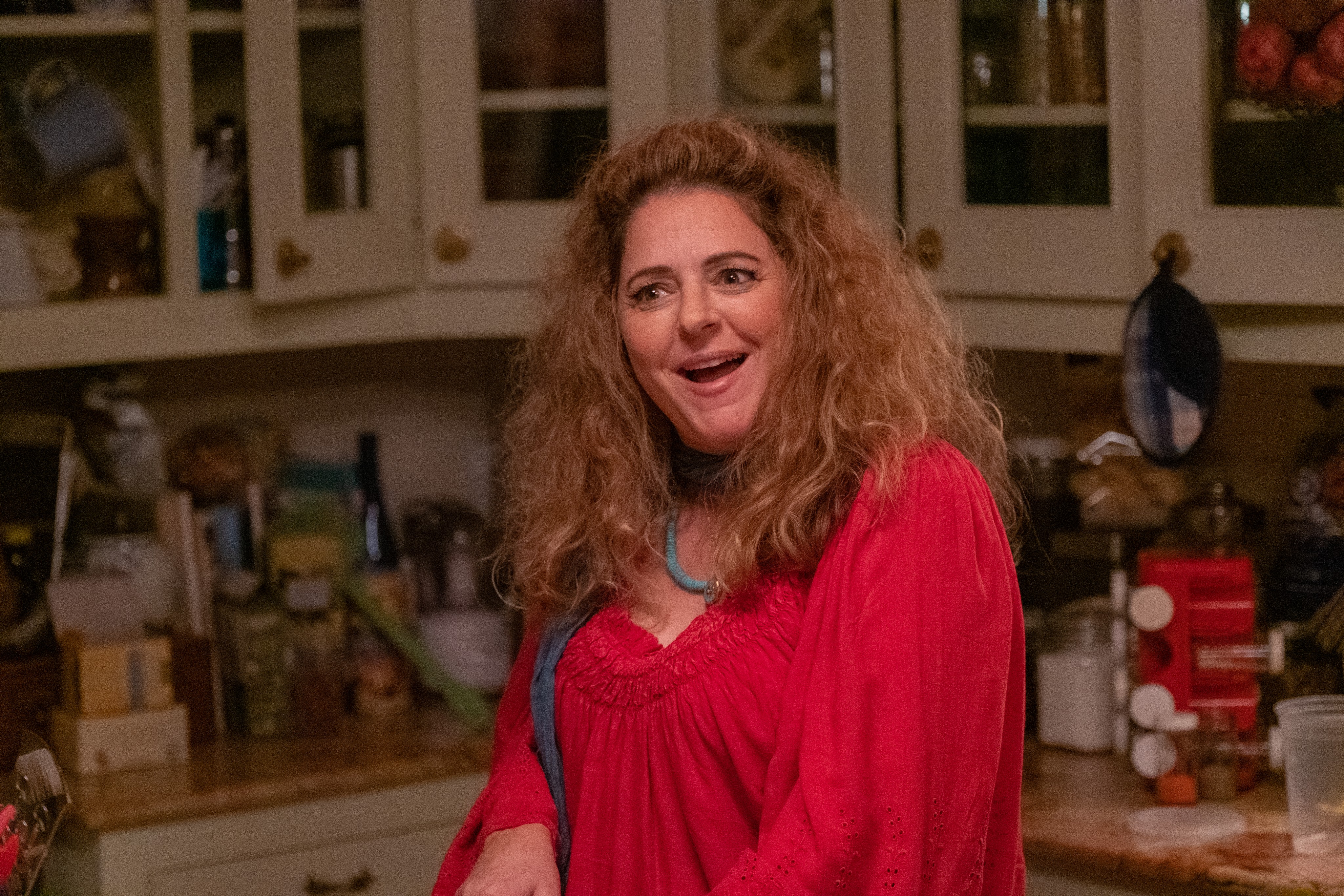 woman in red shirt in Confess, Fletch