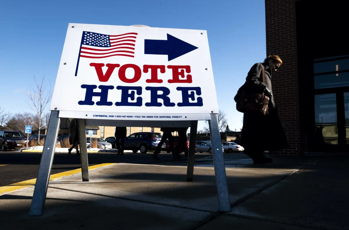 A voter arrives at a polling place in Minneapolis, Minn., on March 3, 2020. (Stephen Maturen/Getty Images)