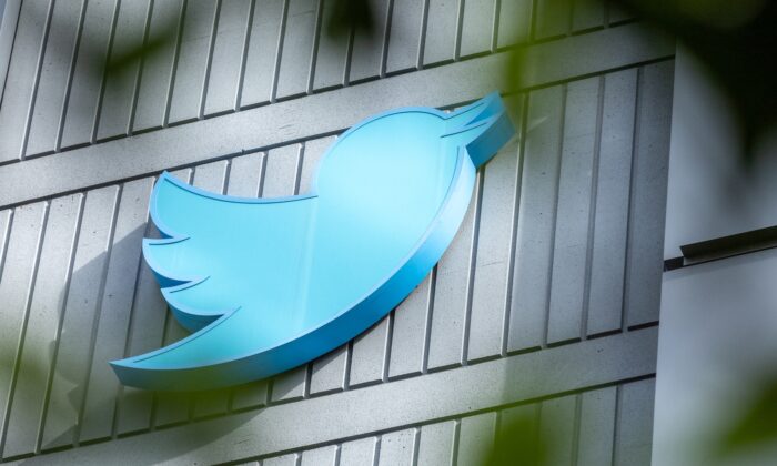 The Twitter logo is seen on a sign on the exterior of Twitter headquarters in San Francisco, Calif., on Oct. 28, 2022 (Constanza Hevia/AFP via Getty Images)