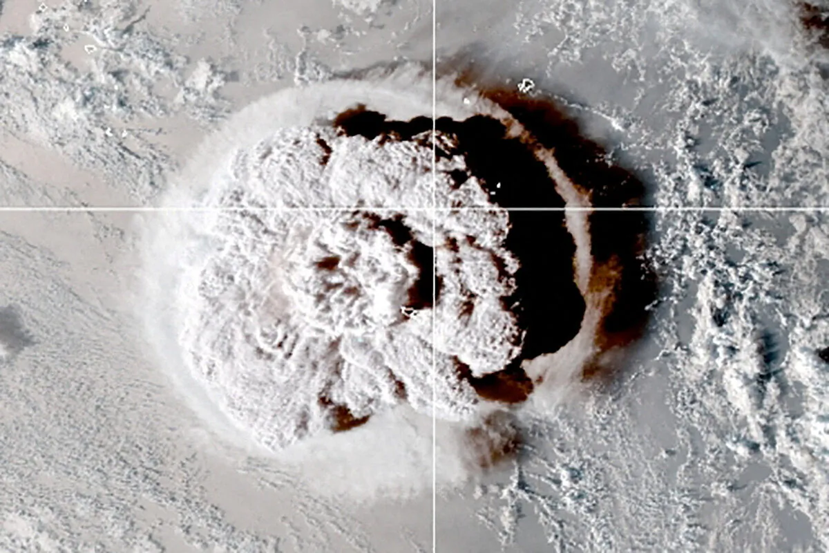 The eruption of an underwater volcano off Tonga, which triggered a tsunami warning for several South Pacific island nations, in an image from the NOAA GOES-West satellite taken at 1:00 a.m. ET on Jan. 15, 2022. (CIRA/NOAA/Handout via Reuters)