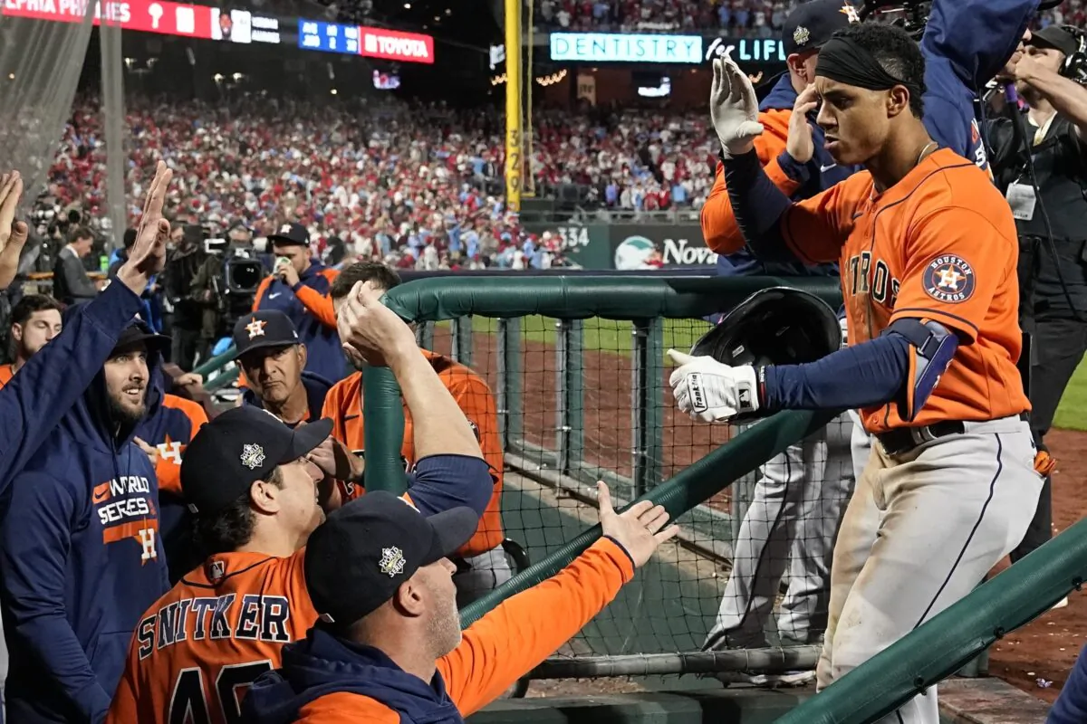 Houston Astros' Jeremy Pena celebrates in the dugout after a home run during the fourth inning in Game 5 of baseball's World Series between the Houston Astros and the Philadelphia Phillies in Philadelphia, on Nov. 3, 2022. (Matt Slocum/AP Photo)