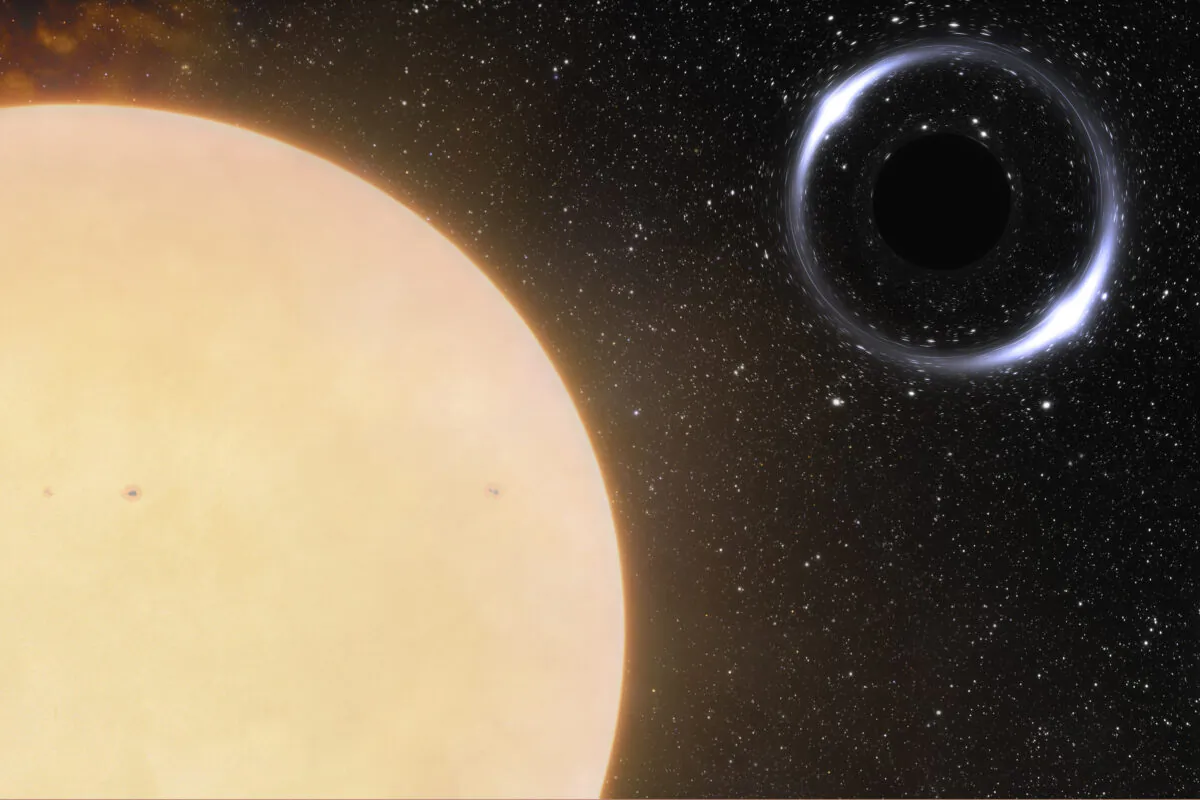 An artist's impression of the closest black hole to Earth and its sun-like companion star are shown in this illustration provided by NOIRLab in November 2022. (International Gemini Observatory/NOIRLab/NSF/AURA/J. da Silva/Spaceengine/M. Zamani)