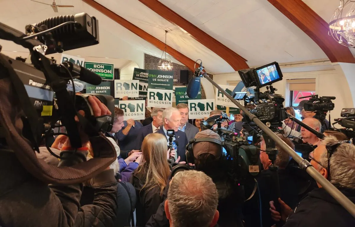 Wisconsin Sen. Ron Johnson talks to reporters after a campaign stop in Waukesha, Wisconsin on Oct. 25, 2022. (Jeff Louderback/Epoch Times)