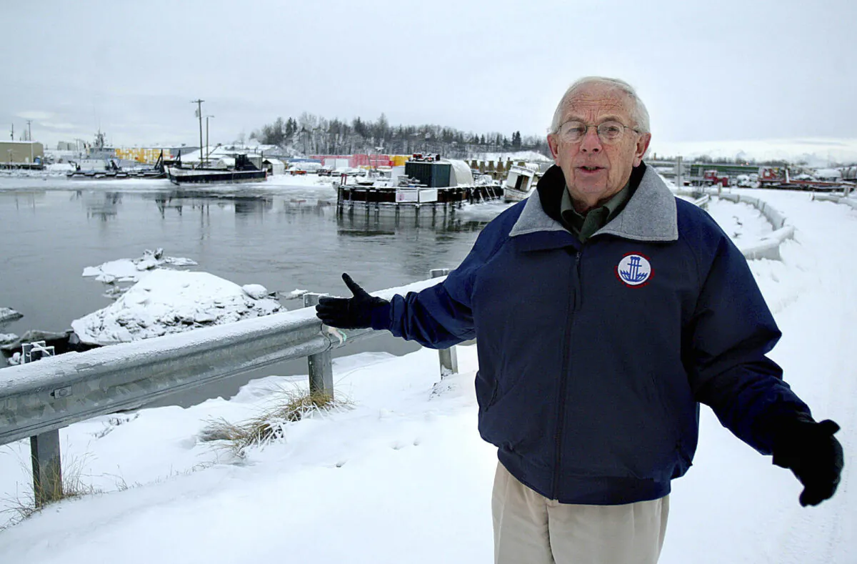 Former Alaska Gov. Bill Sheffield, who later became director of the Port of Anchorage, stands on the bridge over Ship Creek in Anchorage, Alaska, on Jan. 15, 2005. (Al Grillo,File/AP Photo)